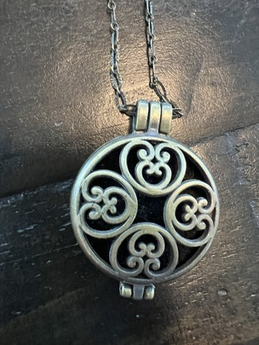 Bronze Filigree Round Diffuser Locket with extra pads included
