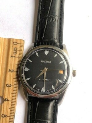 Vintage Tugaris 21 jewels manual wind black dial mens watch .runs