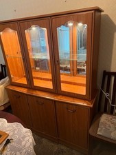 Display cabinet with matching side board and illumination