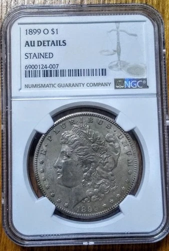 1899 O MORGAN SILVER DOLLAR NGC AU