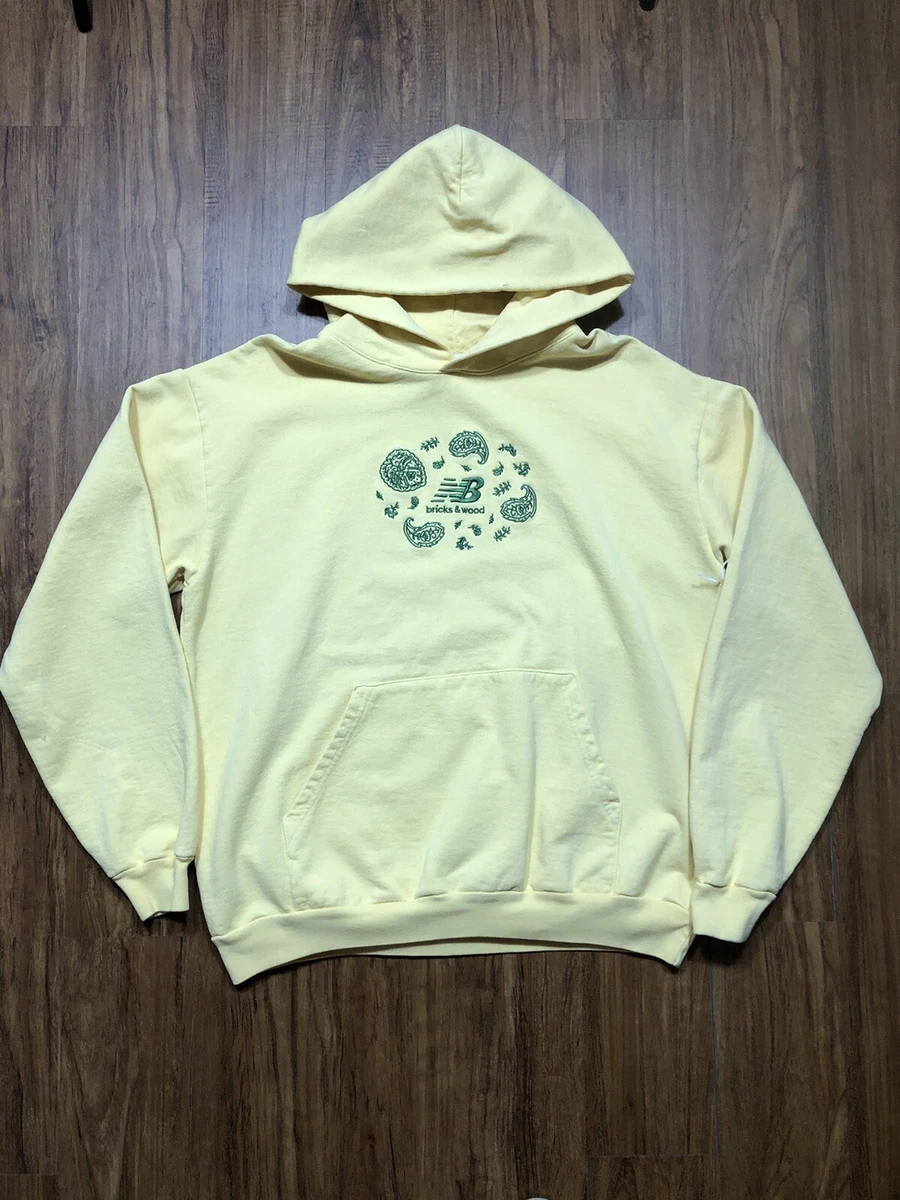 New balance yellow hot sale sweatshirt