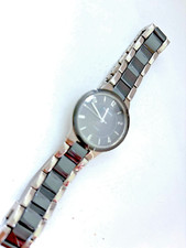 Montre femme mode neuve Titane et céramique. A quartz  Verre saphir 5 ATM