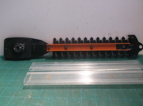 302350003 Blade Assembly & 516819002 Scabbard Off Of A Ryobi P2900 Grass Shear