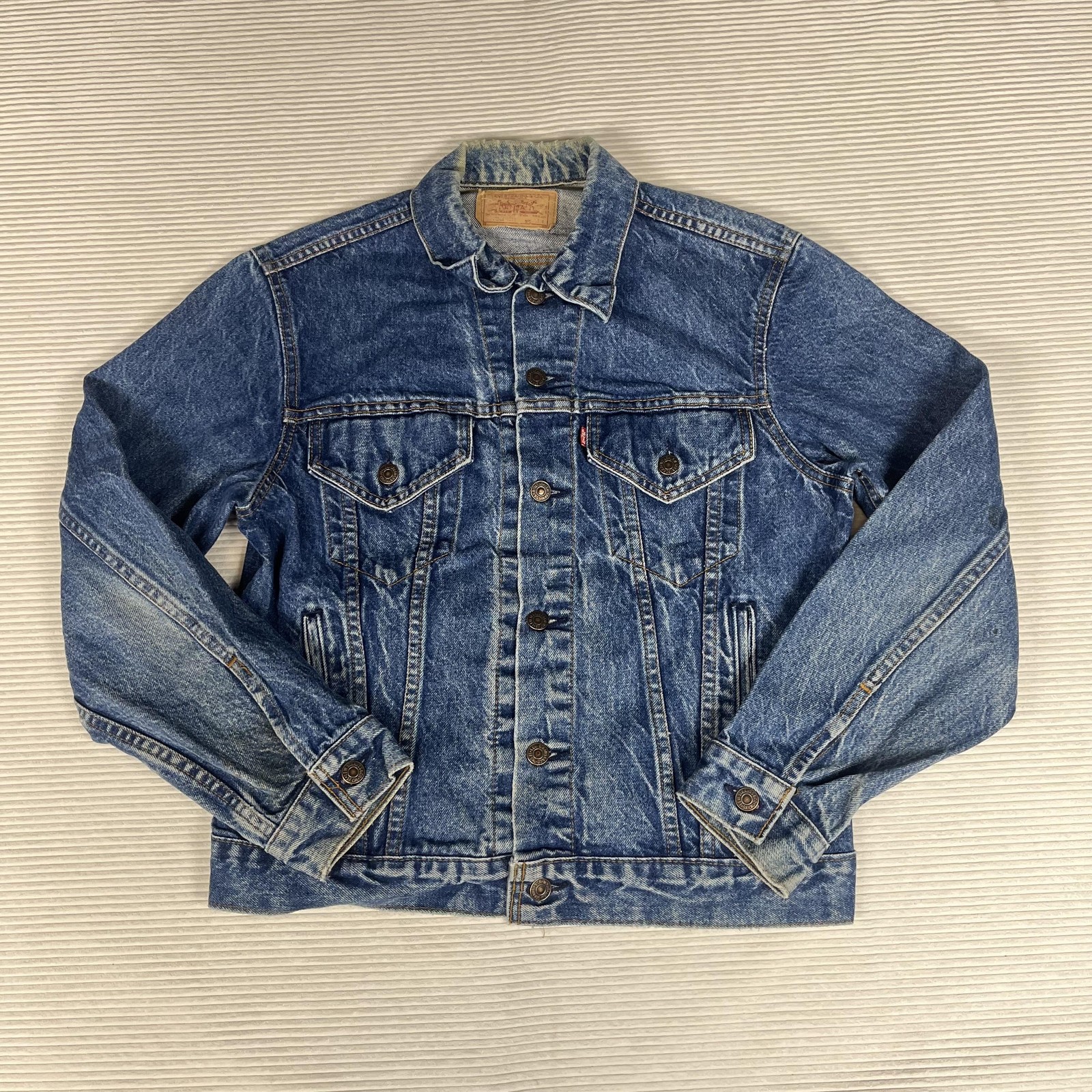 Vintage Levi's faded blue denim trucker jacket, made in USA, style 70506