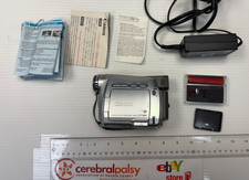 Canon ZR 100 A Mini DV Camcorder w/ Battery  Charger   Has Issues   AS IS