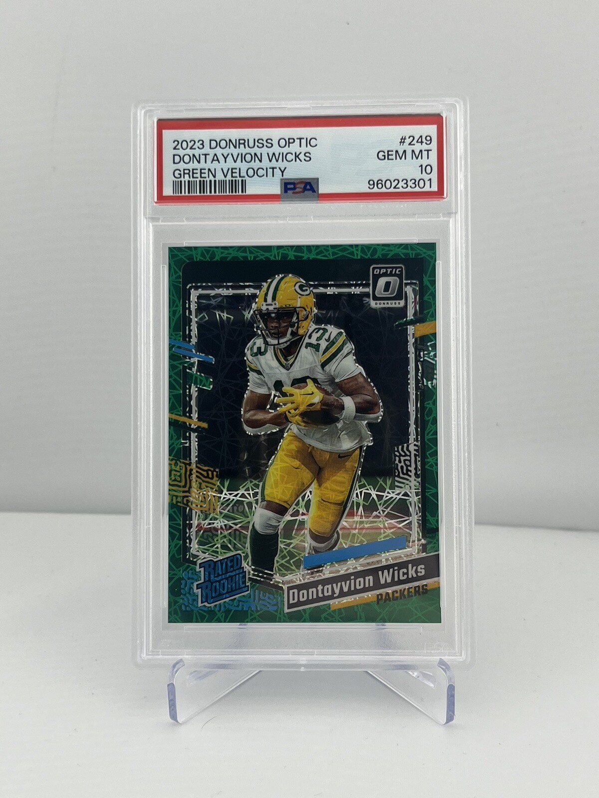 2023 DONTAYVION WICKS PANINI DONRUSS OPTIC GREEN VELOCITY 249 RC Packers PSA 10