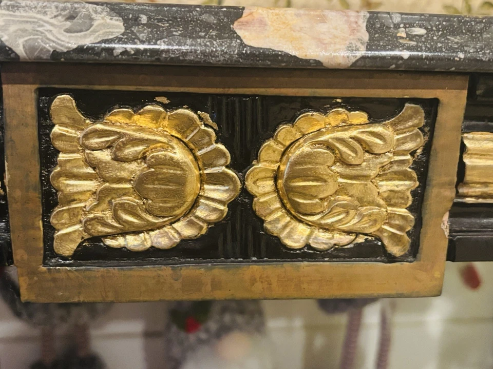 A black lacquered console table with marble top and gold gilt accents. - Image 3 of 4