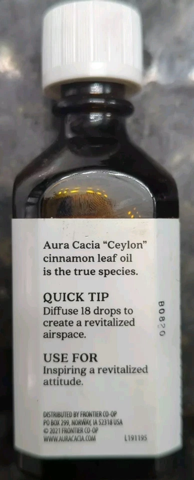 Aceite esencial puro revitalizante de hoja de canela Aura Cacia 2 fl oz botella líquida Foto 3 de 4