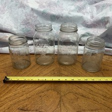 Four mason jars, Hom-pak and Mason star both quart plus two Drey pints!!! 