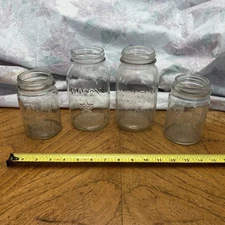 Four mason jars, Hom-pak and Mason star both quart plus two Drey pints!!! 