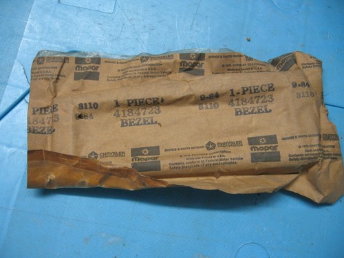 NOS Mopar 1983-88 Dodge Aries Plymouth Reliant door handle bezel unopened - Picture 2 of 2