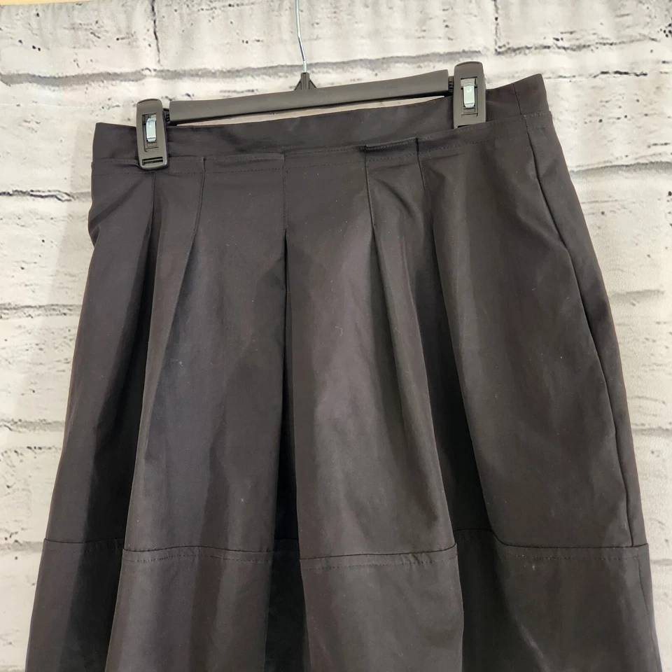 Falda Nanette Lepore Circuit negra lisa para mujer talla 8 plisada forrada Foto 4 de 4