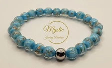 Mystic Firefly bracelet lampwork luminous glass glow in the dark