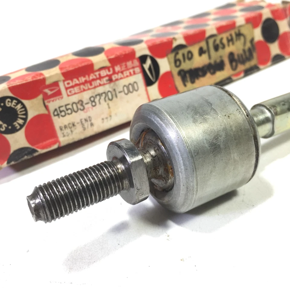 Extremo de cremallera de dirección 1977-1979 Daihatsu Charade genuino NOS Japón 45503-87701-000 Foto 2 de 4