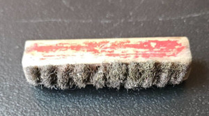 WIRE BRISTLE BRUSH. RECTANGULAR SMALL RED WOOD HANDLE. 2 1/2 INCH. OLD