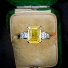 2.6ct Emerald Cut Yellow Sapphire and Diamond Halo Platinum Ring