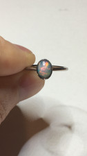  176B- .60ct Genuine Ethiopian Welo Opal Set in a Size 7 Sterling Silver Ring