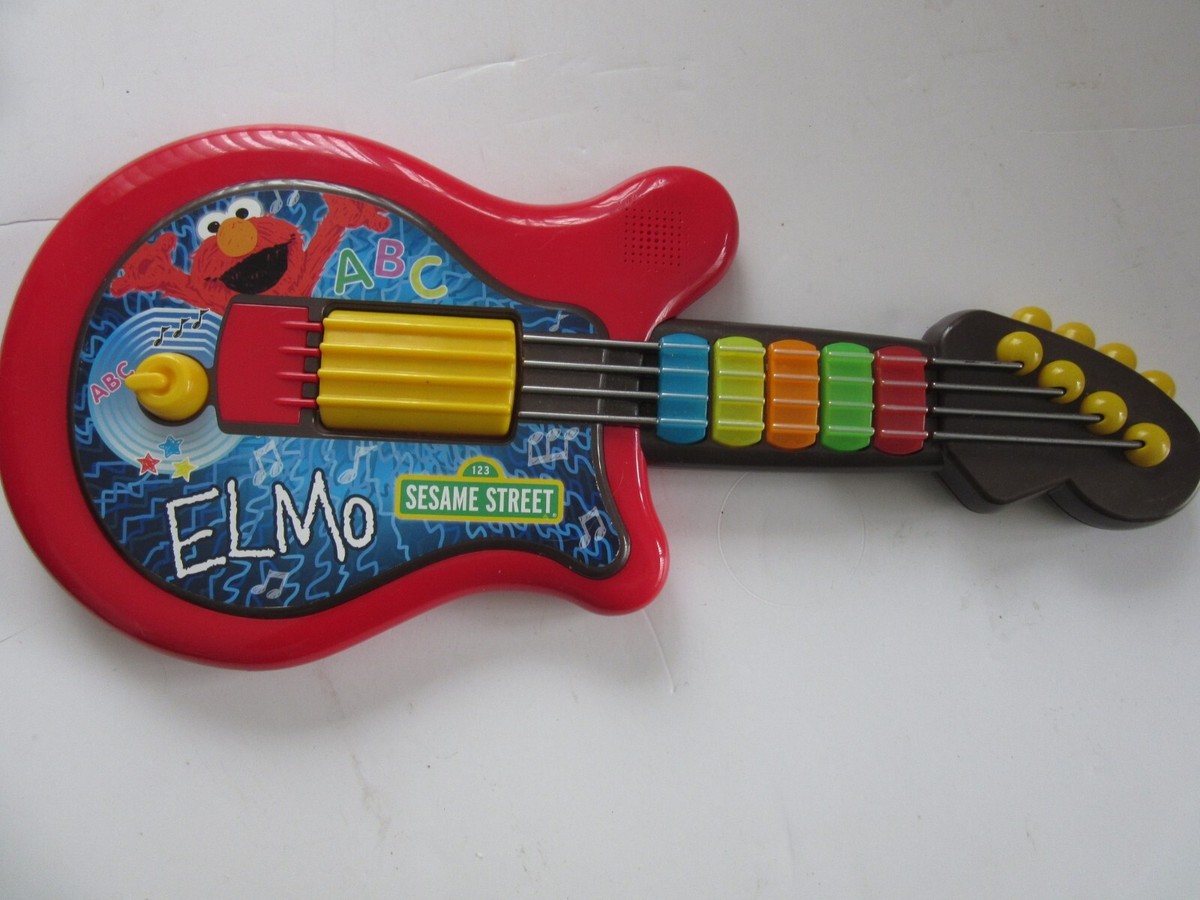Hasbro Red Sesame Street Elmo Let's Rock Guitar battery