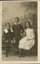RPPC Derby England Edwardian upper class children expensive clothes studio photo
