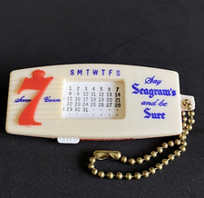 Seagrams 7 Seven Crown Whiskey Keychain Perpetual Calendar Novelty Gift USA Vtg
