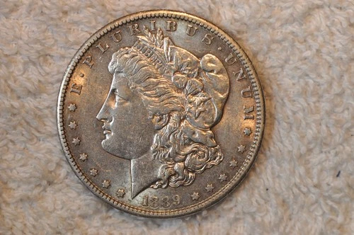 1889-S  AU  MORGAN DOLLAR