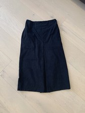 2 Pleated mid length skirts with pockets in Black and Brown