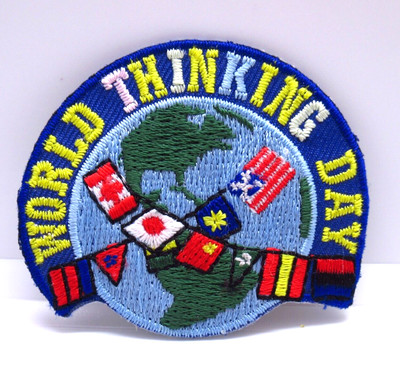 World Thinking Day - World Flags Over Globe - Iron On Patch - Girl Scouts