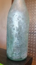 1900s aqua pickaxe  bottle
