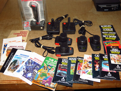 ATARI lot- controllers & instruction booklets- paddle, driving, NOS PointMaster