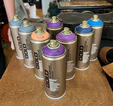 Lot of 8 Cans of Montana Gold Spray Paint Lakers Violet, Gravel, and More