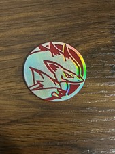 Pokemon TCG Zoroark czerwony srebrny plastikowy medal moneta rzadka umiarkowanie grana