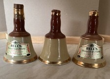 THREE EMPTY SMALL WADE  BELLS’S OLD SCOTCH WHISKEY DECANTERS