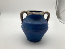 Romanian Decorative Ceramic Vase With Metallic Accents And Textured Blue Glaze