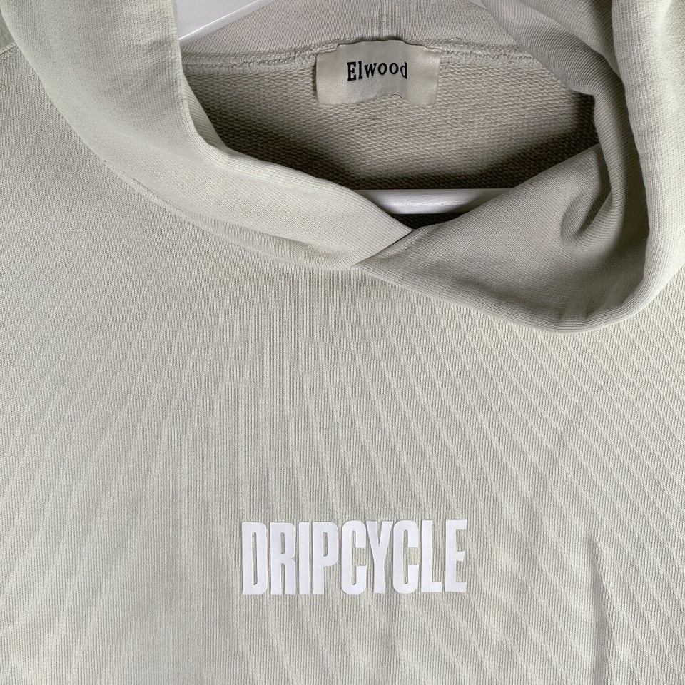 Sudadera con Capucha Elwood Para Hombre Mediana Beige Core Sudadera Minimalista Orgánica Logo Secado por Goteo Foto 3 de 4