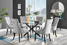 Image of NOVARA 120cm Round Glass & Black Leg Table & 6 Faux Leather Belgravia Chairs