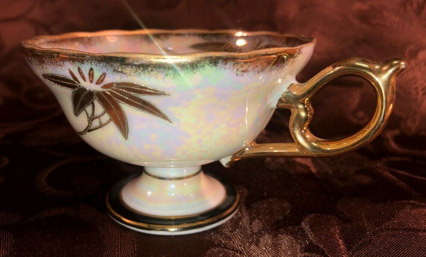 Vintage Castle china tea cup and saucer iridescent w/ gold accents(1156