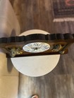 Wooden mantel clock with porcelain dial and gilt bronze cherub decorations — photo 6