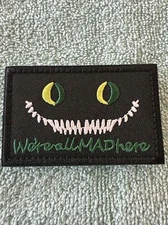 CHERSHIRE CAT WE’RE ALL MAD HERE 2x3 Embroidered Morale Patch Hook Backing New