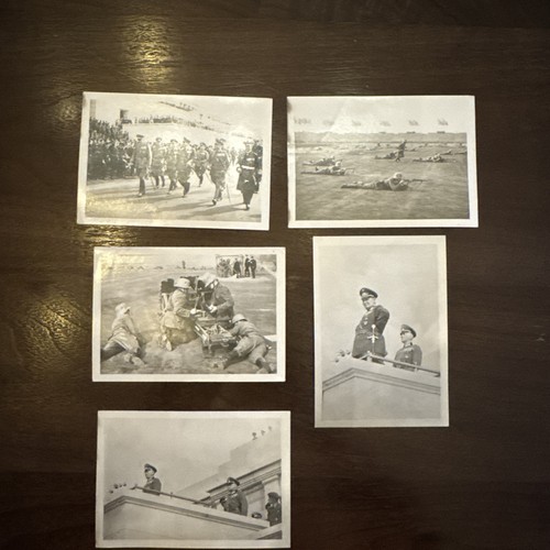 A collection of historical black and white military World War 11 photographs.