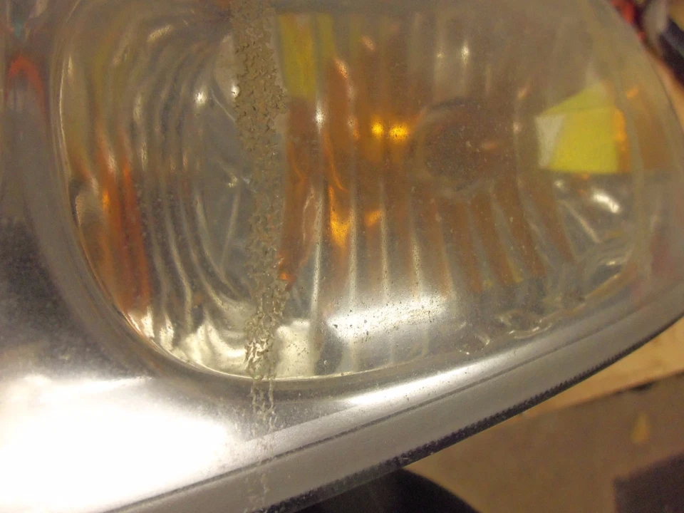 Faro delantero izquierdo Saturn Ion 2003-2007 22730913 Foto 3 de 4