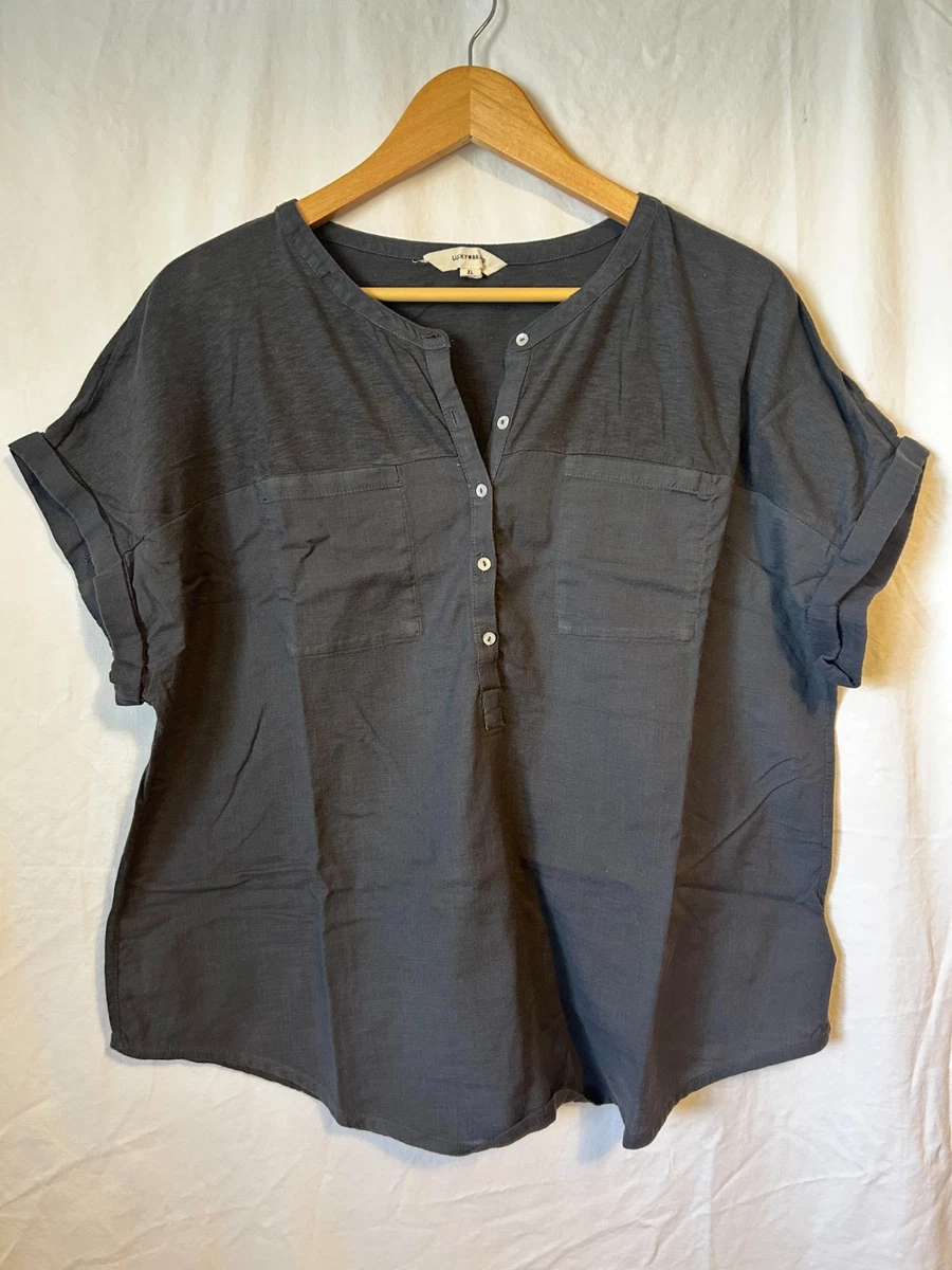 Blusa da donna a maniche corte con scollo a V, senza colletto