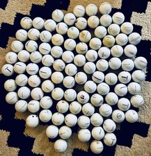 100 Titleist golf balls 2A/shag including premium models. See photo.