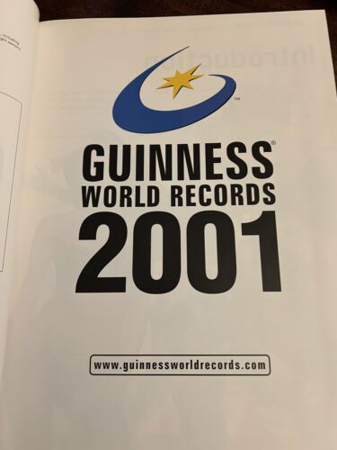 Guinness World Records 2001 Into the New Millennium Holographic Hardcover book - Imagen 4 de 11
