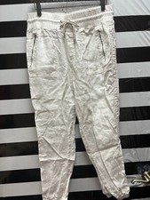 Women "Athleta" off white tannish jogging pants w/ drawstring Size 10. P.O.