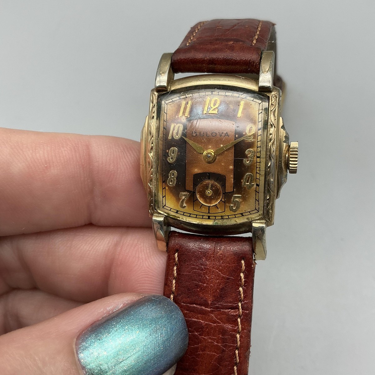 BULOVA 手巻き 稼働 シャンパンゴールド タンクローマン ヴィンテージ s-l1200.jpg