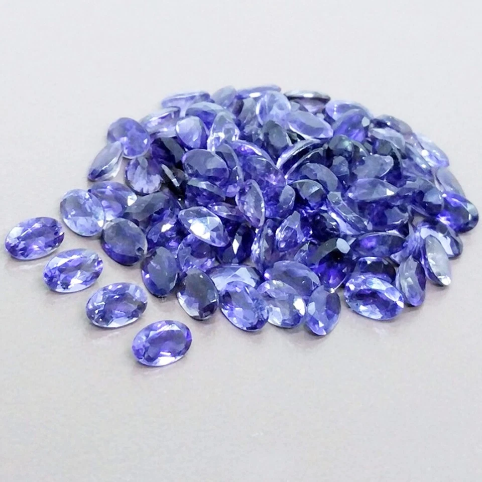 Venta al por mayor Lote de piedras preciosas calibradas sueltas de iolita natural facetadas ovaladas de 5x3 mm Foto 2 de 3