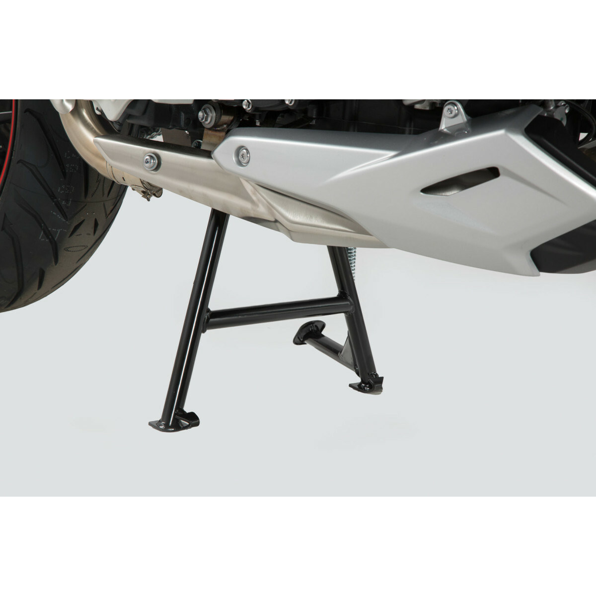 Béquille centrale Triumph Tiger 1050i évite les chutes et facilite l'entretien