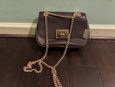 Coach Purse with leather outside and Velvet i...