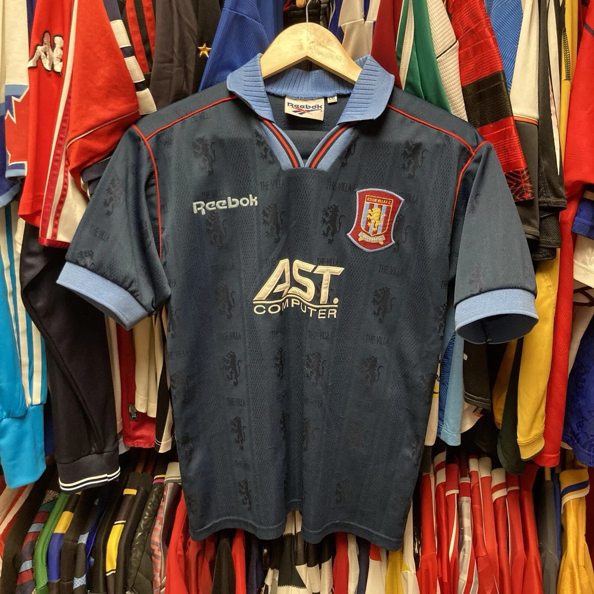 Preços baixos em Reebok ASTON Villa International Club Camisas de