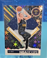 2024-25 Panini NBA Hoops Nikola Jokić Winter Tribute Parallel Nuggets #Tribute.